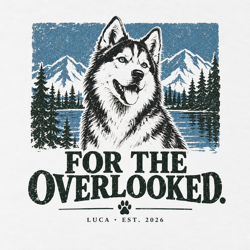 Close-up of the husky, mountains and For the Overlooked back design on the white Luca Original Tee